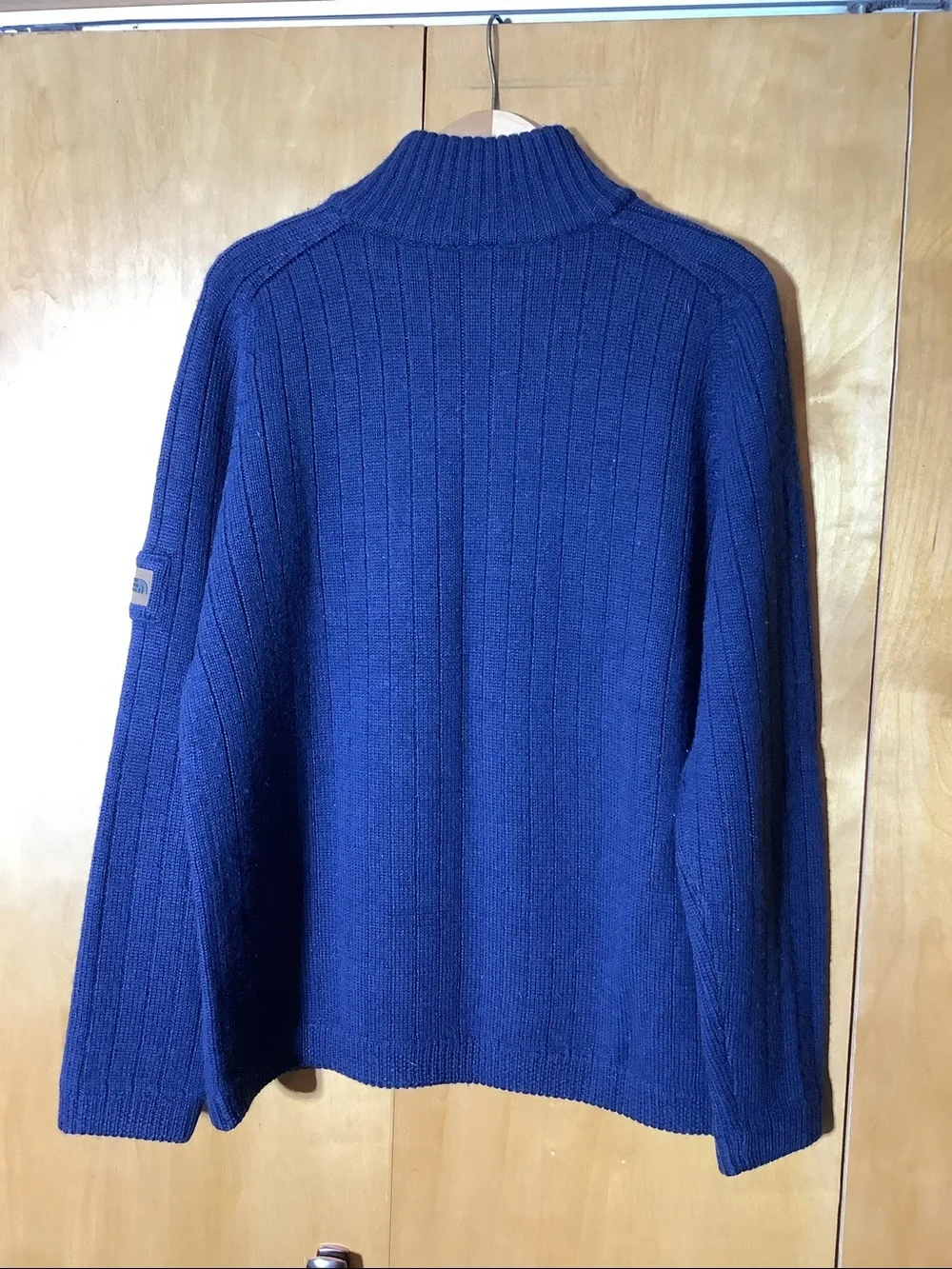 North Face 100% wool navy with gray stripes 1/4-zip sweater, size medium